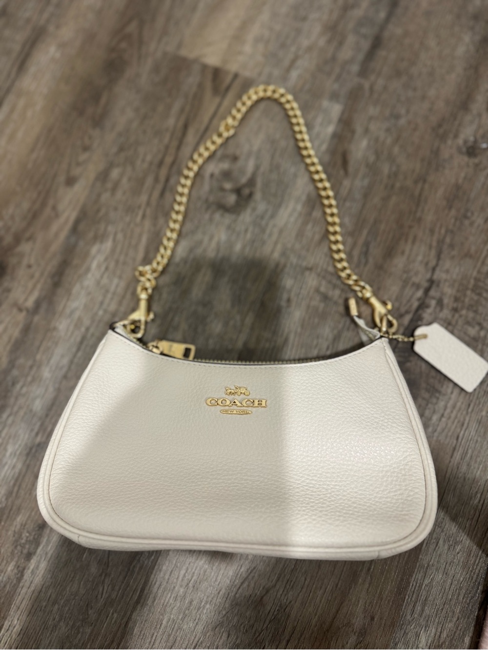 Coach Cream mini hand/crossbody bag.